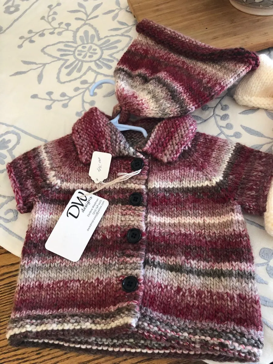 Hand-knitted cardigan in burgundy and cream stripes