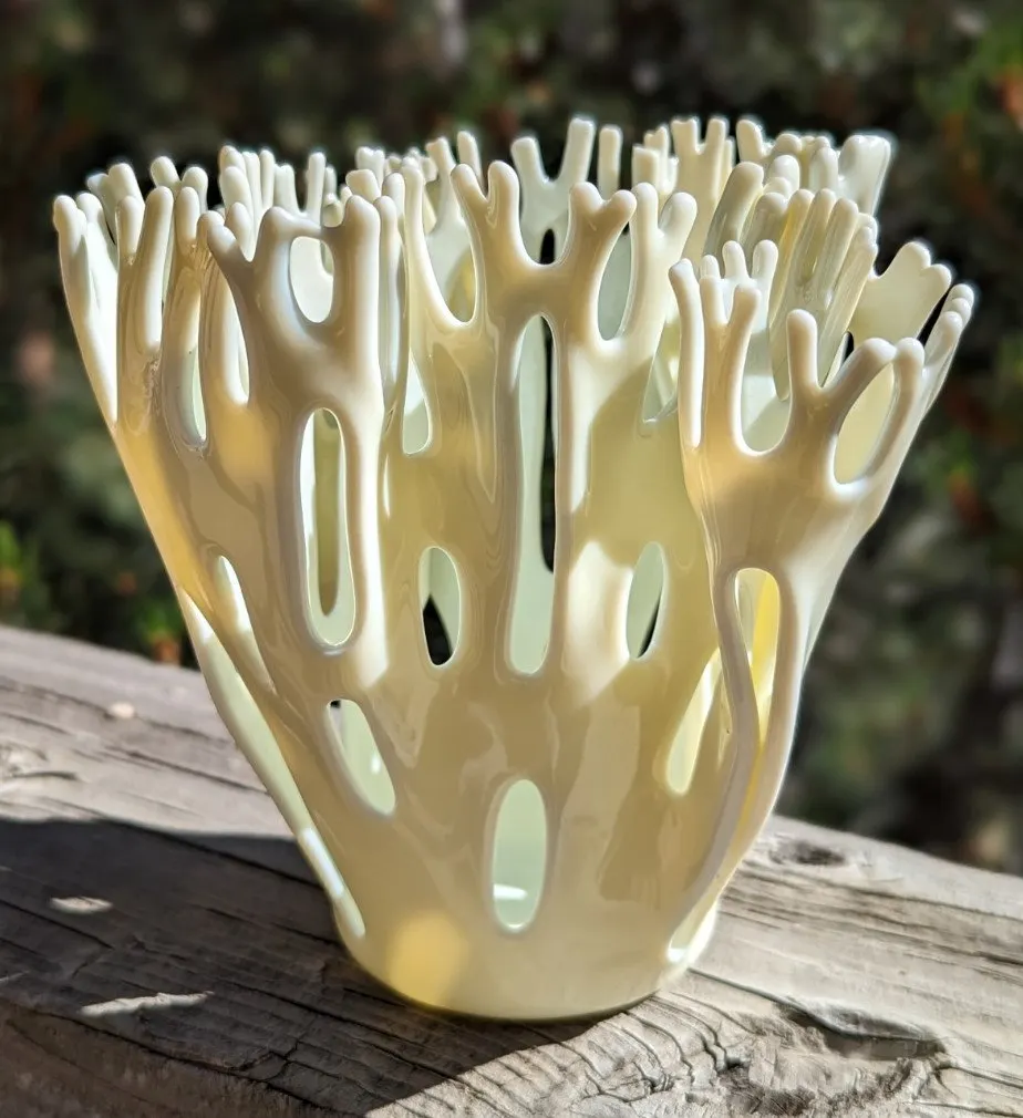 Openwork fused glass vessel in cream resembling branching coral
