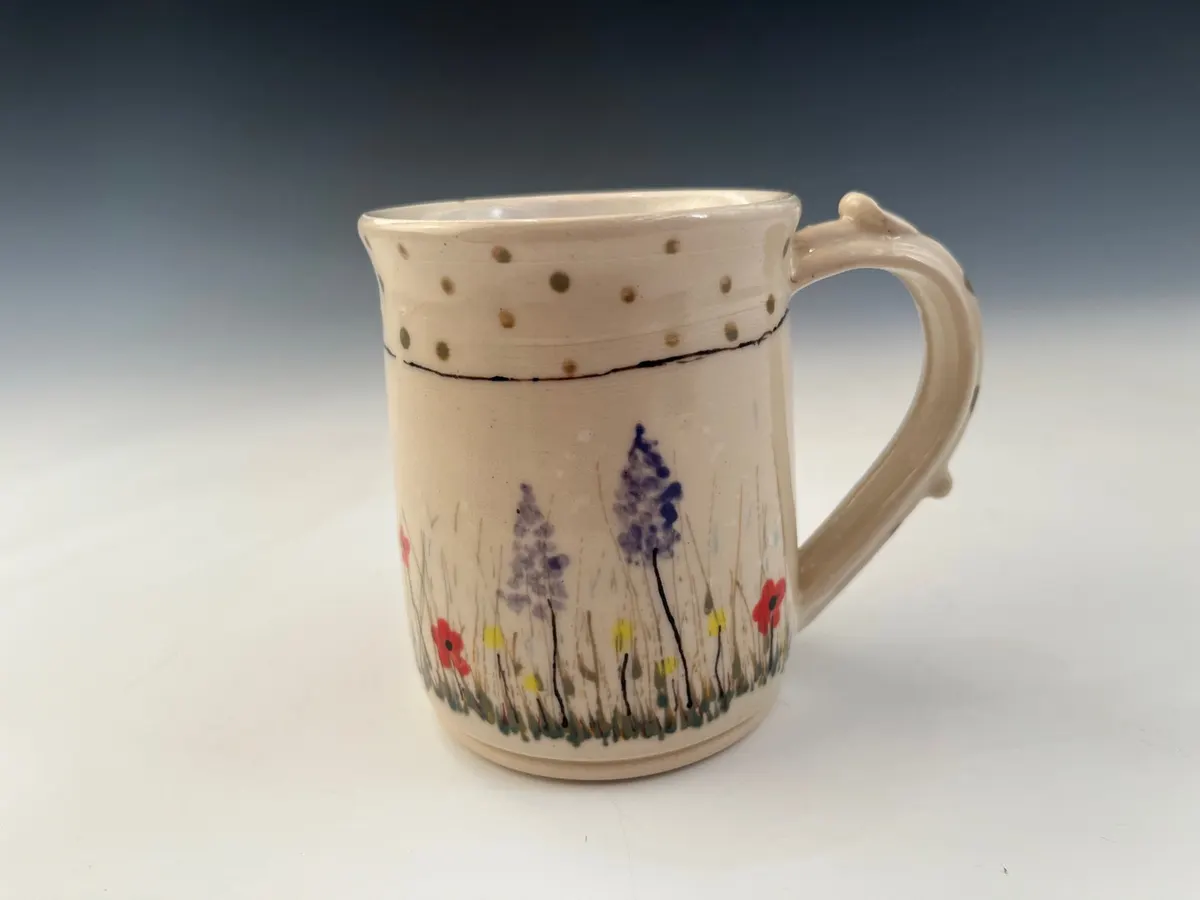 Cream mug hand-painted with lavender sprigs and black dots