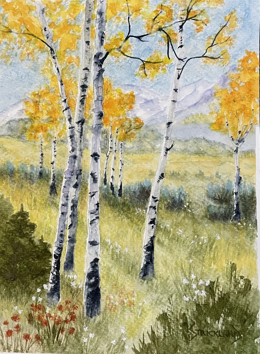 Watercolour of aspens in autumn gold with a mountain beyond