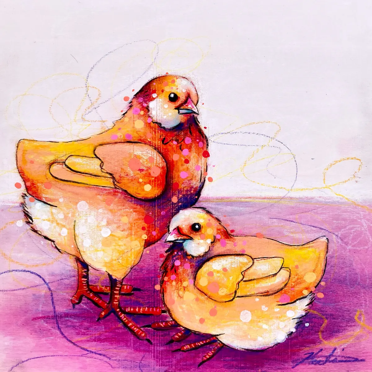 Two painted chicks in orange and yellow with dotted detail