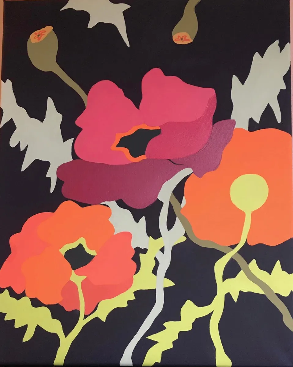 Pink, magenta and orange poppies on a dark ground with pale leaves
